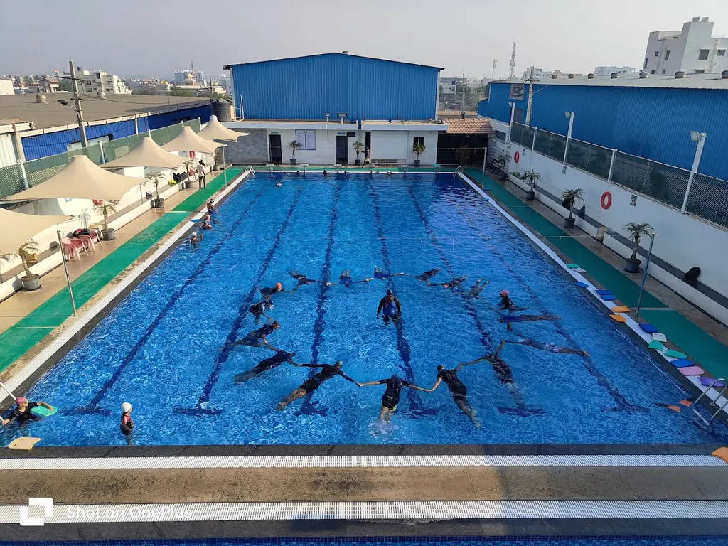 Golden Fins Sports Club — Badminton in NRI Layout