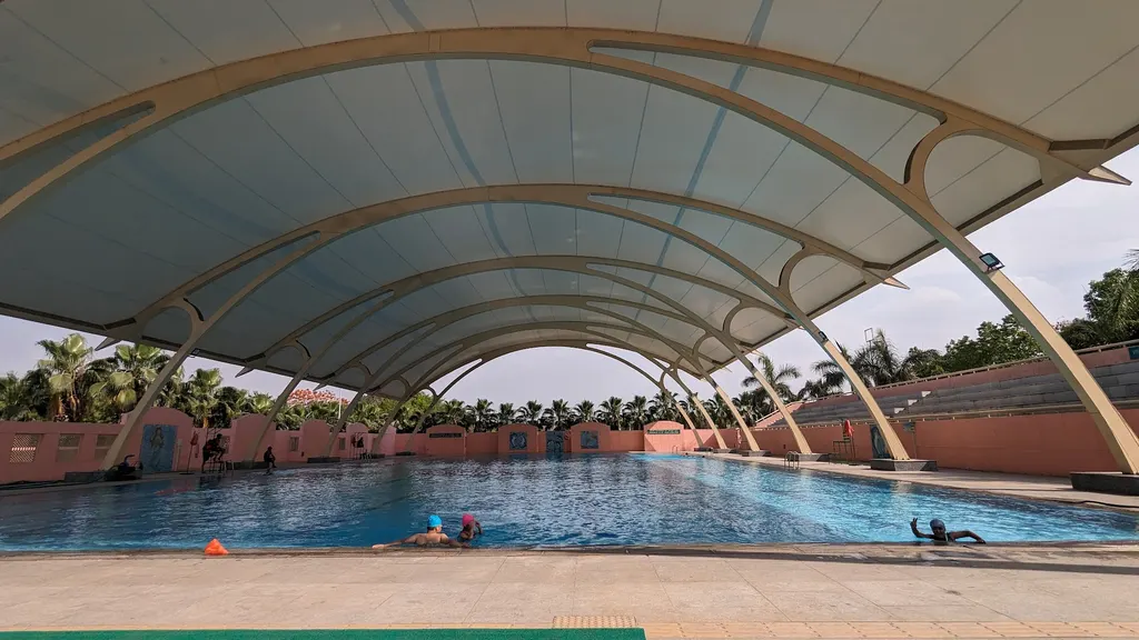 Chilla Olympic Size Pool — Swimming in Vasundhara Enclave
