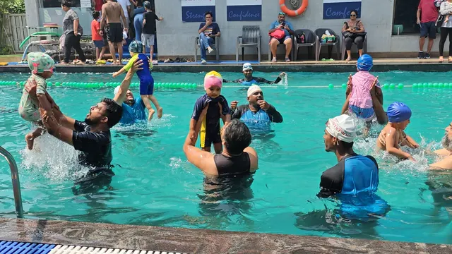 Michael Phelps Swimming at The Sahar Plaza — Swimming in Andheri East